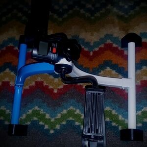 Under desk exercise bike with progress display panel